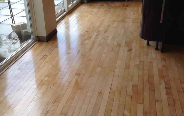 A wood strip floor after sanding